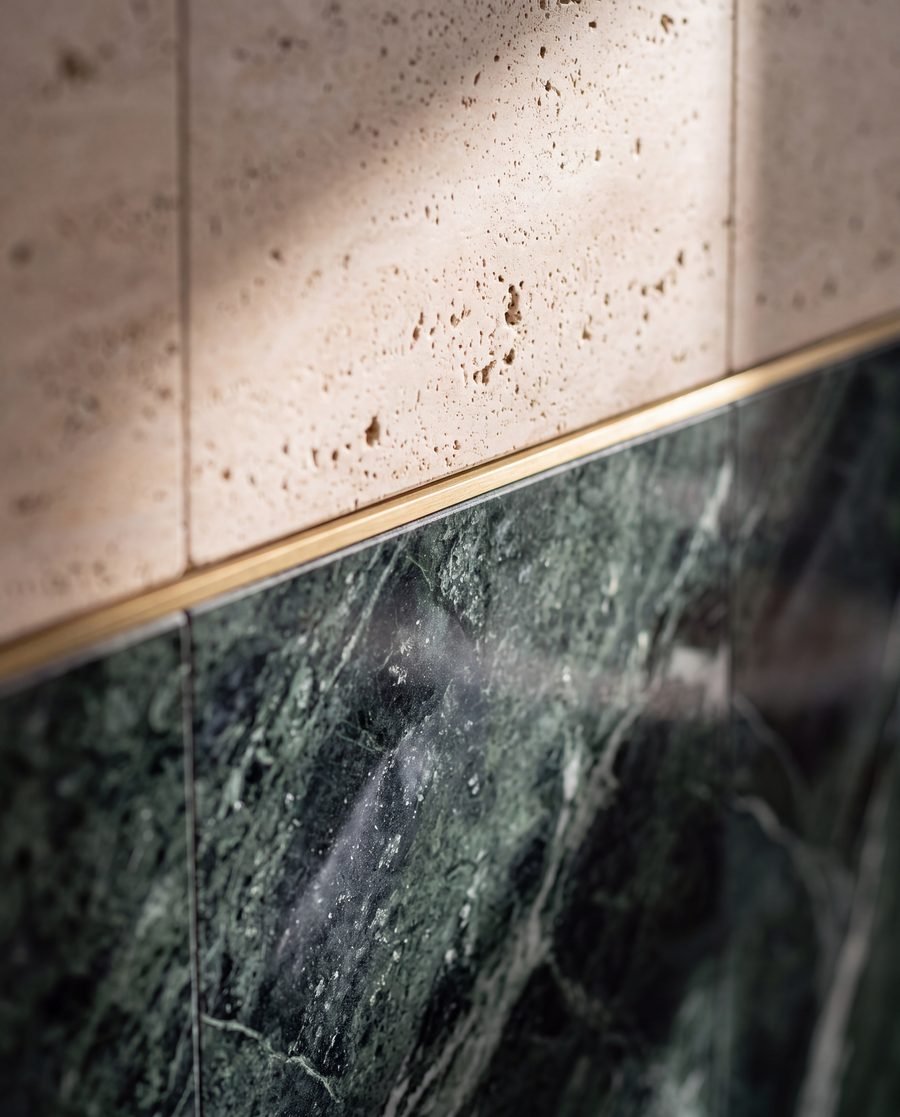 Verde Alpi marble meeting travertine